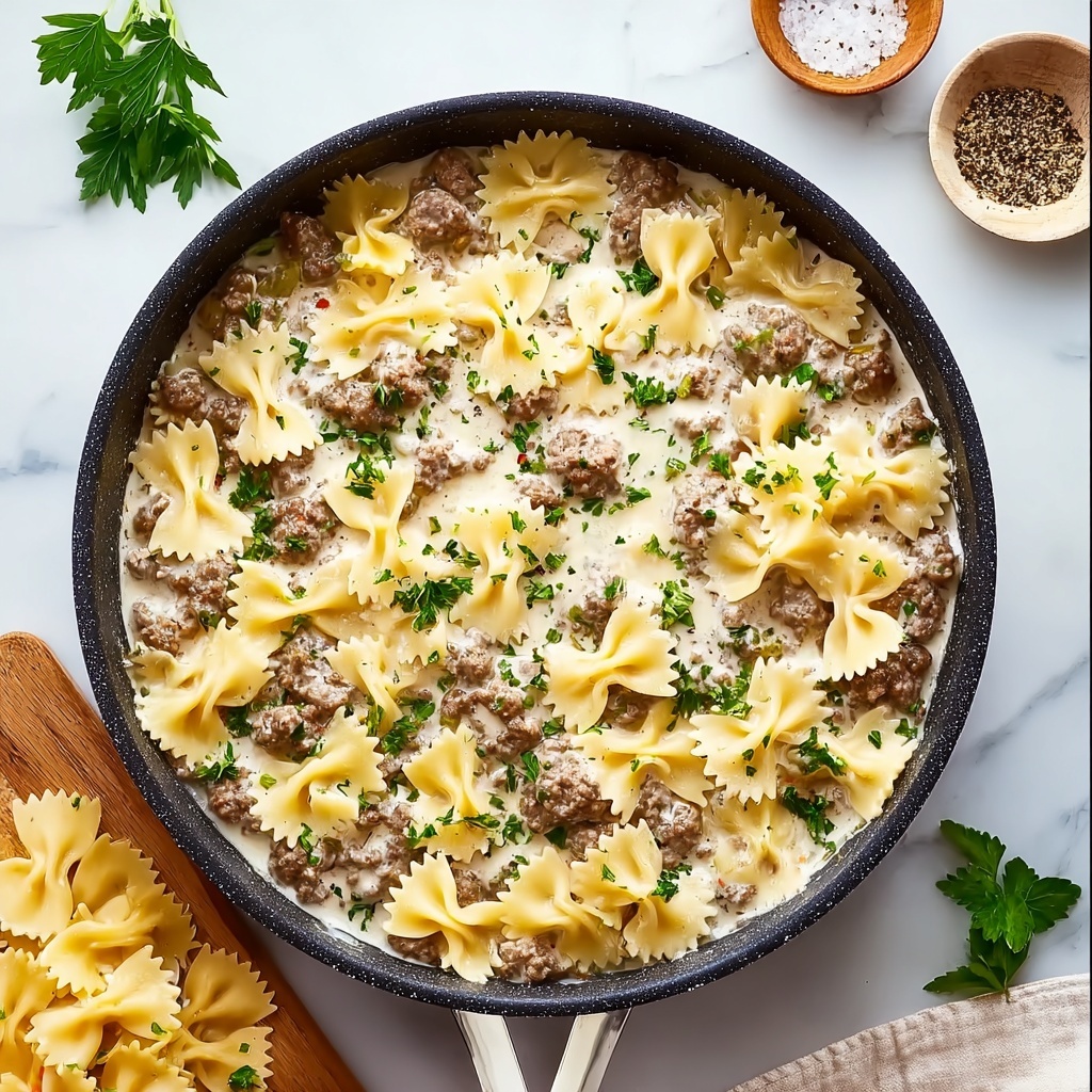 Beef and Bowtie Pasta with Creamy Alfredo Sauce Recipe - Recipe Image