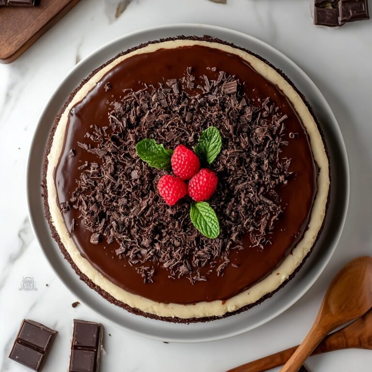 German Chocolate Poke Cake with Caramel, Coconut, and Pecans Recipe